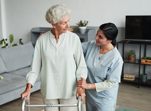 patient and nurse walking